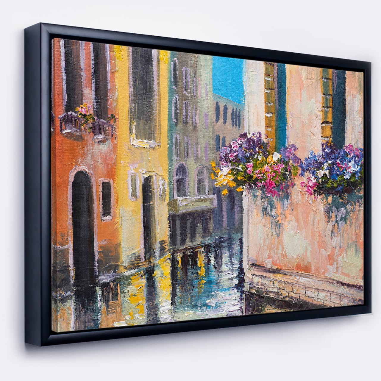 Designart - Canal in Venice with Flowers - Cityscape Canvas Art Print in Black Frame